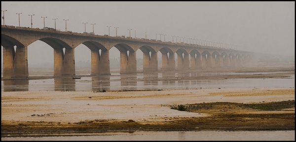 Click here to view Bridge Over Ganges River by Jack Wickes 