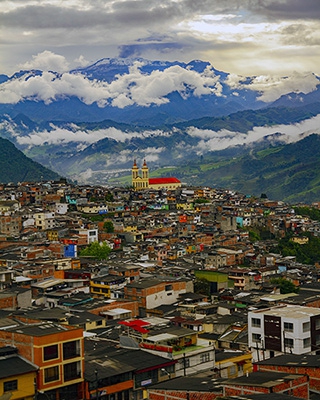 Click here to view Red Roof Beneath the Volcano by Jack Wickes 